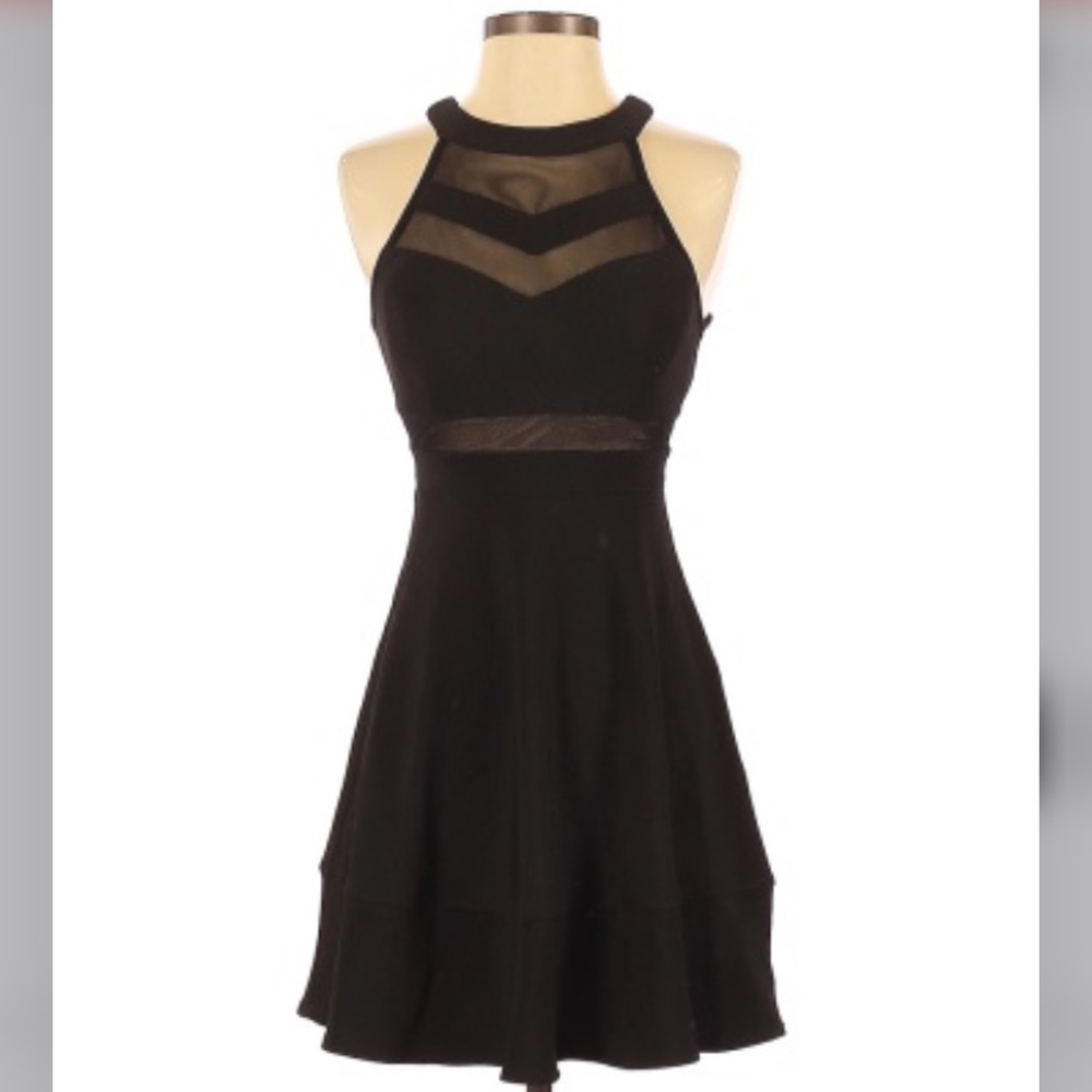 black mini dress with mesh design at top